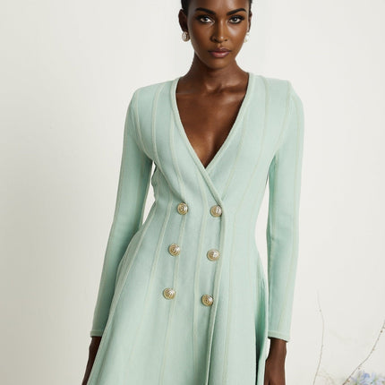 Dayana Mini Dress in Light Green with embossed gold-tone buttons and V neck, crafted from luxurious knitted fabric