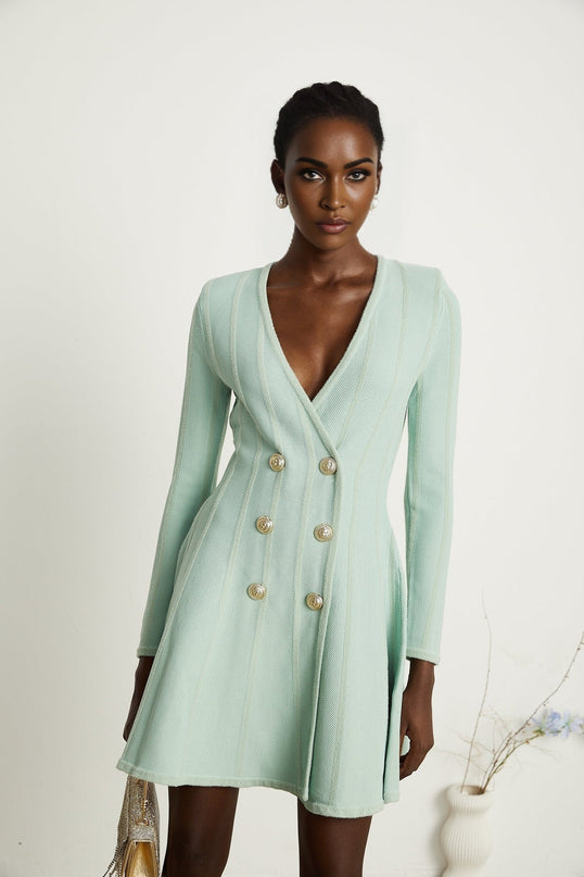 Dayana Mini Dress in Light Green with embossed gold-tone buttons and V neck, crafted from luxurious knitted fabric