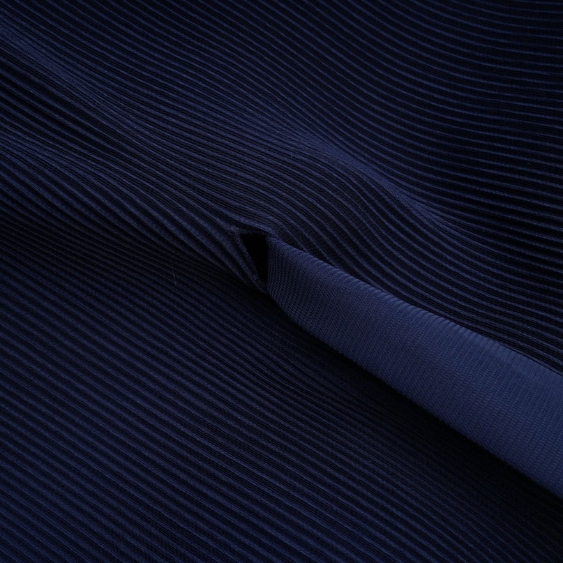 Debbie matching set featuring a blue pattern printed cape and creased skirt against a plain background