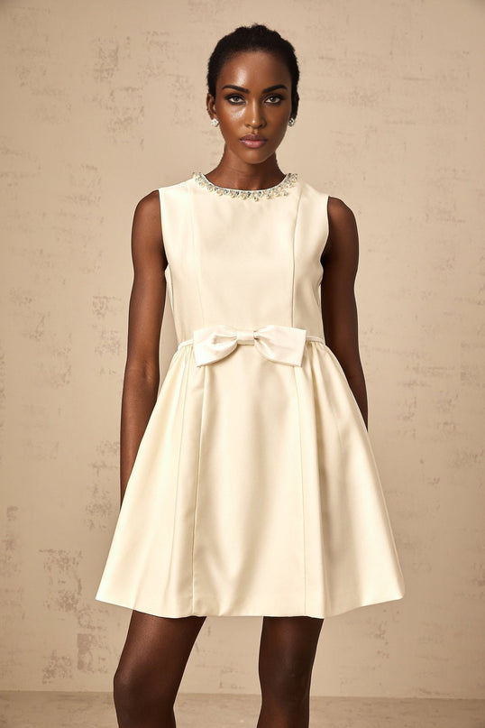 Delizia Ivory White Mini Dress with Faux-pearl Embellishment Sleeveless Bowknot Pleat Flared Skirt Crew Neck Rear Zip Thigh-length