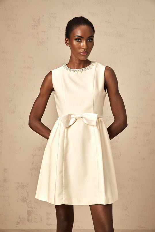 Delizia Ivory White Mini Dress with Faux-pearl Embellishment Sleeveless Bowknot Pleat Flared Skirt Crew Neck Rear Zip Fastening Thigh-length