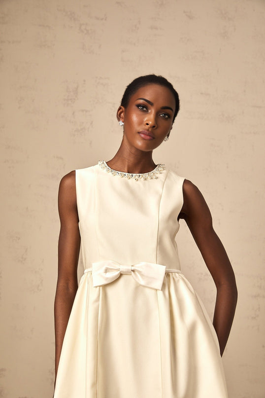 Delizia Ivory White Mini Dress with Faux-pearl Embellishment and Bowknot Detailing