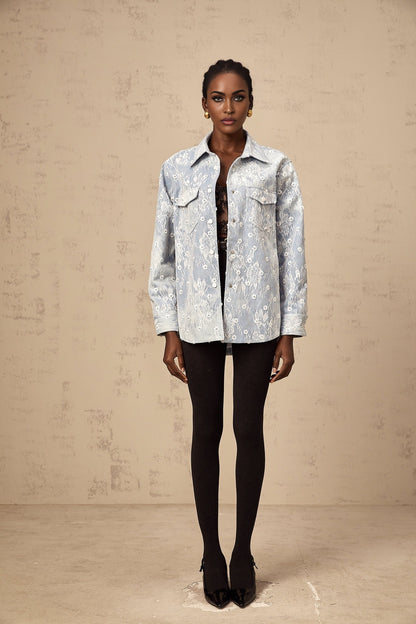 Denim jacket in light blue with shiny blue sequins and floral applique designs