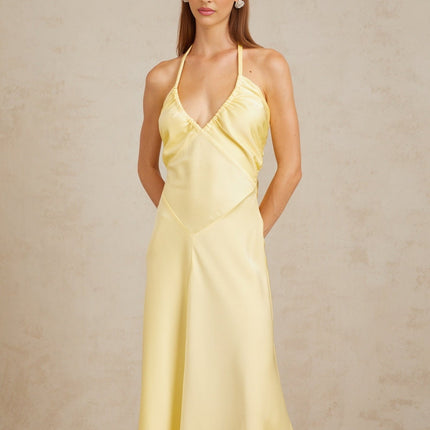 Diana Maxi Dress in Radiant Yellow Halterneck Sleeveless Open Back Self-Tie Cinched Waist Ruched Detailing Flared Hem 100% Terylene Fiber Statement of Refined Elegance Special Occasions Chic Daytime Event Luxurious Ensemble