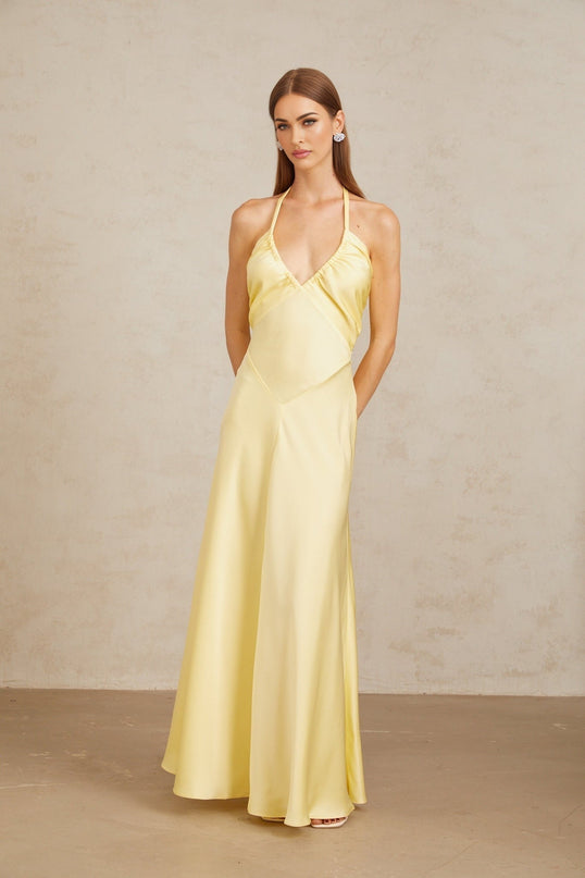 Diana Maxi Dress in Radiant Yellow Halterneck Sleeveless Open Back Self-Tie Cinched Waist Ruched Detailing Flared Hem 100% Terylene Fiber Elegant Statement Special Occasions Chic Daytime Event Luxurious Ensemble