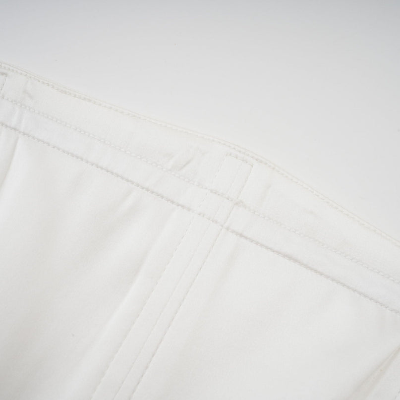Diletta White Maxi Dress with Ruffled-cut Trim and Pleated Design