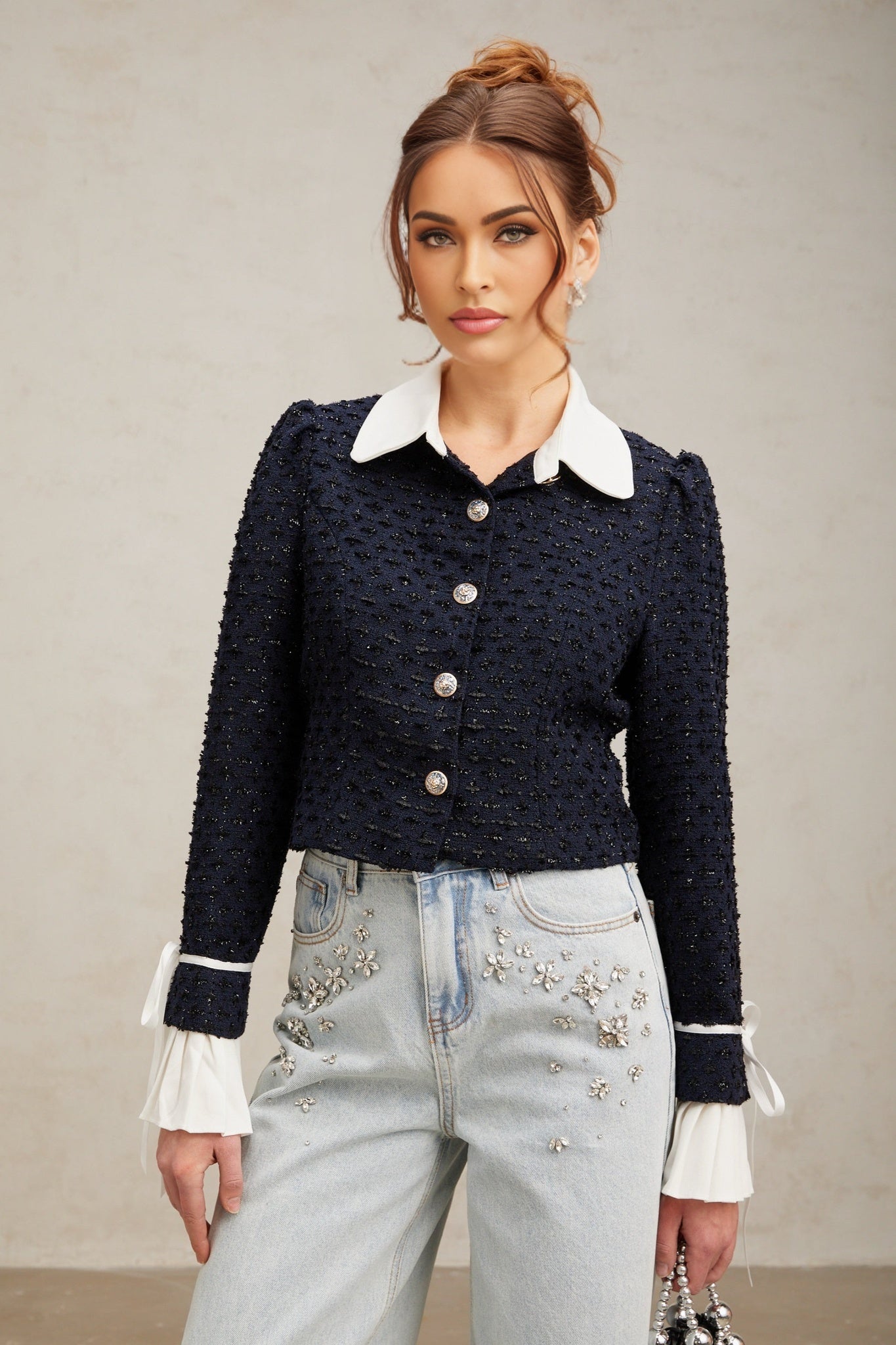 Doriane navy blue jacket with tweed panels and a structured silhouette