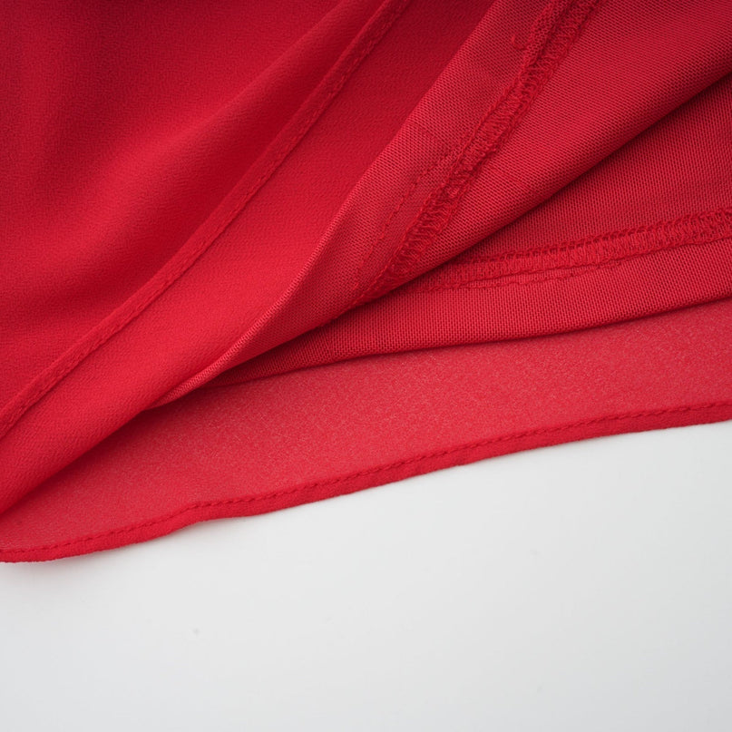 Dorotea Red Asymmetric Mini Dress with Open Back and Shoulder Pads