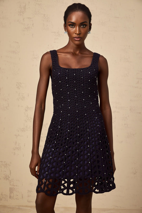 Edelie dark blue mini dress with embellished details and cut out design featuring crochet knit pattern