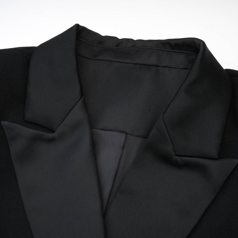 Eithne Black Wool Blend Double-breasted Coat with Notched Lapels and Covered Button Closure