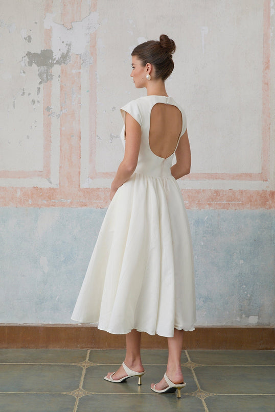Elda Ivory White Midi Dress Cap Sleeves Bateau Neckline Cinched Waist Pleated Detailing Open Back Side Slit Pockets Rear Button Fastening Side Zip Closure Calf-Length Terylene Fiber