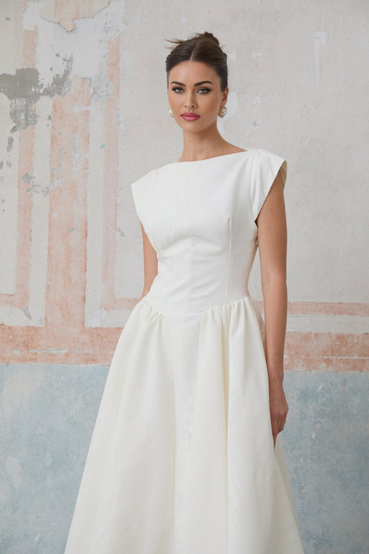 Elda Ivory White Midi Dress Cap Sleeves Bateau Neckline Cinched Waist Pleated Detailing Open Back Side Slit Pockets Rear Button Fastening Side Zip Closure 100% Terylene Fiber Calf-Length