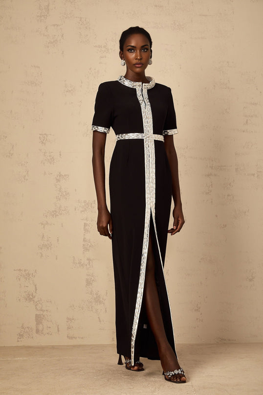 Elegant black maxi dress with front slit and crystal embellishments