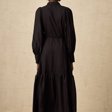 Elegant black midi dress with lace embroidery details and delicate floral patterns