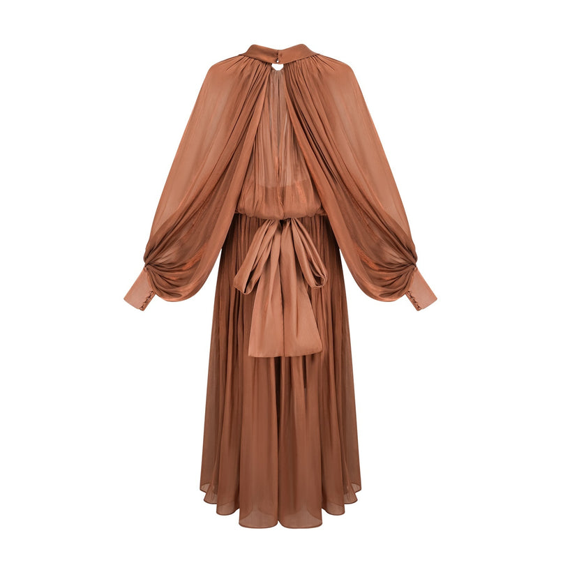 Elegant brown pleated satin maxi dress with flowing skirt and sleek silhouette