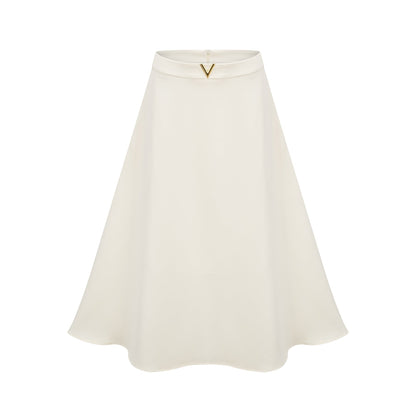 Elegant neutralcolored matching set featuring a top and skirt with delicate 3D petal details