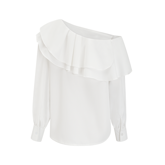 Woman Wearing White Blouse Featuring Floral Embroidery and Flowy Design