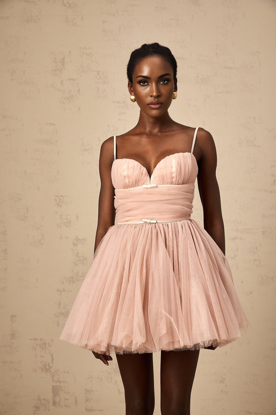 Eleonora Pink Tulle Pleated Mini Dress with Flare Spaghetti Straps Sweetheart Neckline Bustier Style Ruched Detailing Boned Bodice Layered Skirt Above-Knee Length 80% Polyamide 20% Elastane Rear Zip Fastening