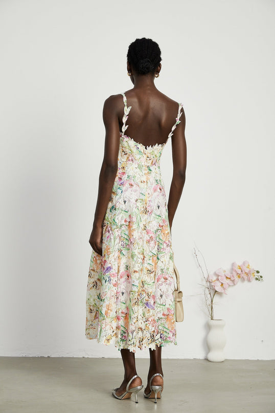 Emery White Floral Midi Dress elegance sophistication V-neckline spaghetti straps floral embroidery A-line skirt luxurious blend fabrics rear zip fastening midi length daytime events evening soirées timeless charm refinement
