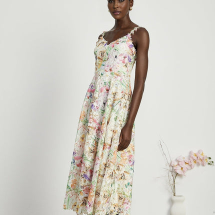 Emery White Floral Midi Dress elegance sophistication V-neckline spaghetti straps floral embroidery A-line skirt luxurious fabrics rear zip fastening midi length daytime events evening soirées timeless charm Emery Floral Midi Dress statement refinement