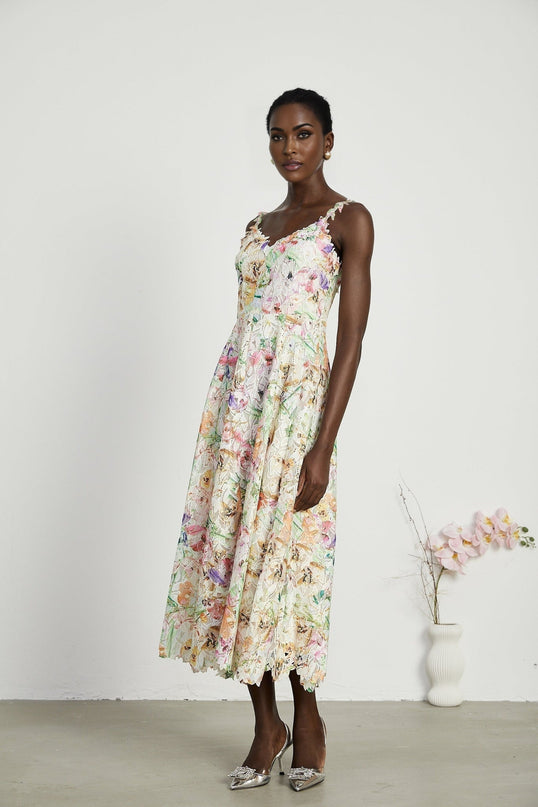 Emery White Floral Midi Dress elegance sophistication V-neckline spaghetti straps floral embroidery A-line skirt luxurious fabrics rear zip fastening midi length daytime events evening soirées timeless charm Emery Floral Midi Dress statement refinement