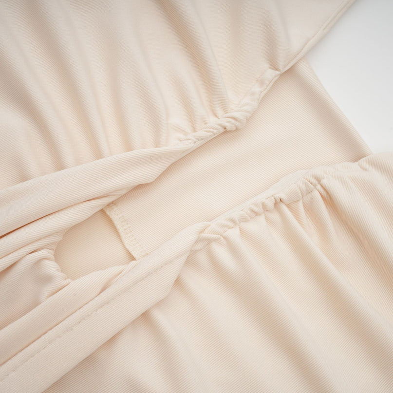 Emilia White Maxi Dress with Deep V-Neck and Halterneck Design