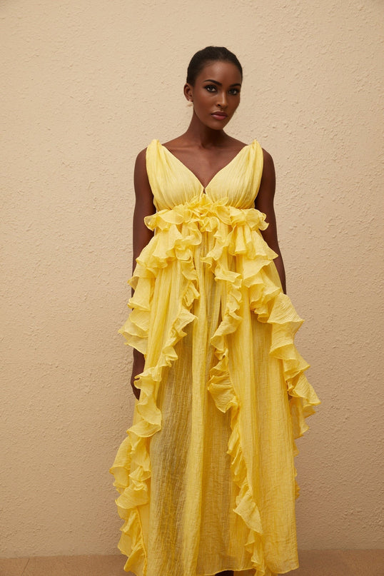 Emilia Yellow Maxi Dress V-neck Sleeveless Open Back Ruffled Detailing Layered Asymmetrical Hem Tassel Detail Terylene Fiber Glamour