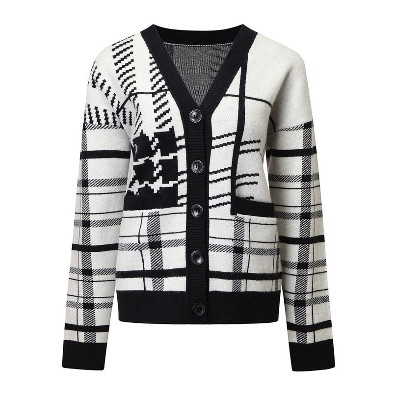 Emily wearing black and white plaid cardigan sweater with V-neckline and full sleeves