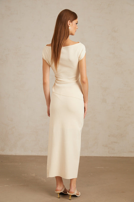 Emily wearing Étienne Floral Appliqué Knit Top & Skirt Set in Neutrals