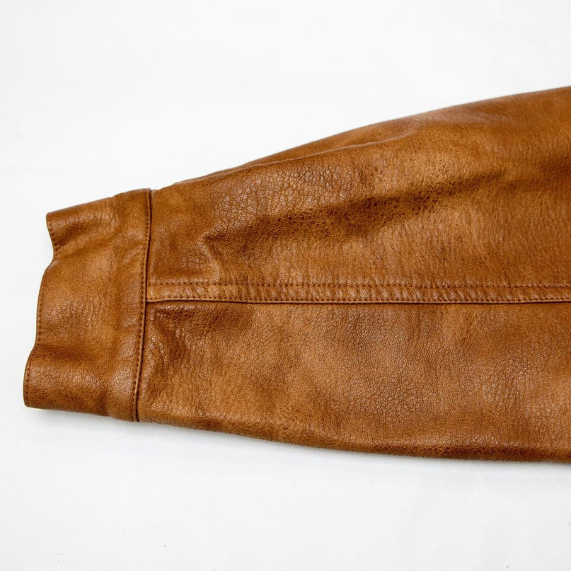 Emily wearing Vintage Brown PU Leather Bomber Jacket