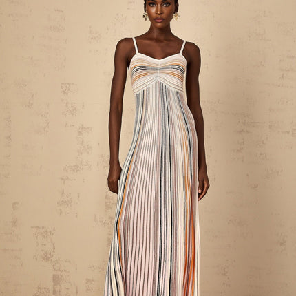 Emma Maxi Dress in Neutrals Sequined Stripes Metallic Accents Sweetheart Neckline Spaghetti Straps Knitted Construction Stripe Pattern Sequin Embellishments Metallic Threading Pleated Ruched Detailing Maxi Length Blend of Viscose Metallic Fiber Nylon Elastane