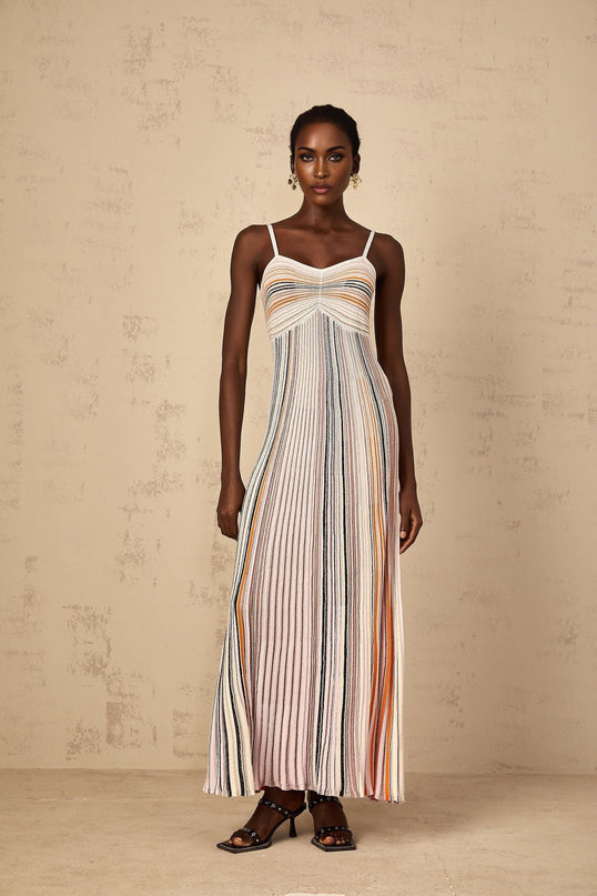 Emma Maxi Dress in Neutrals Sequined Stripes Metallic Accents Sweetheart Neckline Spaghetti Straps Knitted Construction Stripe Pattern Sequin Embellishments Metallic Threading Pleated Ruched Detailing Maxi Length Blend of Viscose Metallic Fiber Nylon Elastane