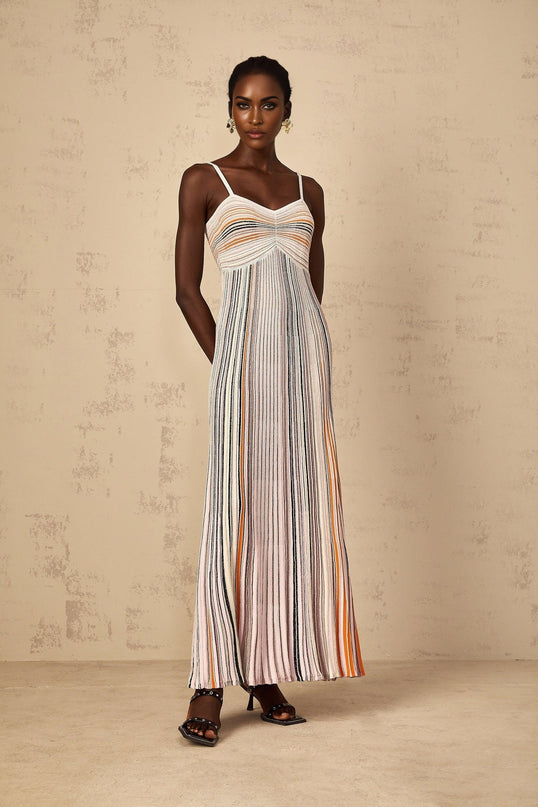 Emma Maxi Dress in Neutrals Sequined Stripes Metallic Accents Sweetheart Neckline Spaghetti Straps Knitted Construction Stripe Pattern Sequin Embellishments Metallic Threading Pleated Ruched Detailing Maxi Length Viscose Metallic Fiber Nylon Elastane