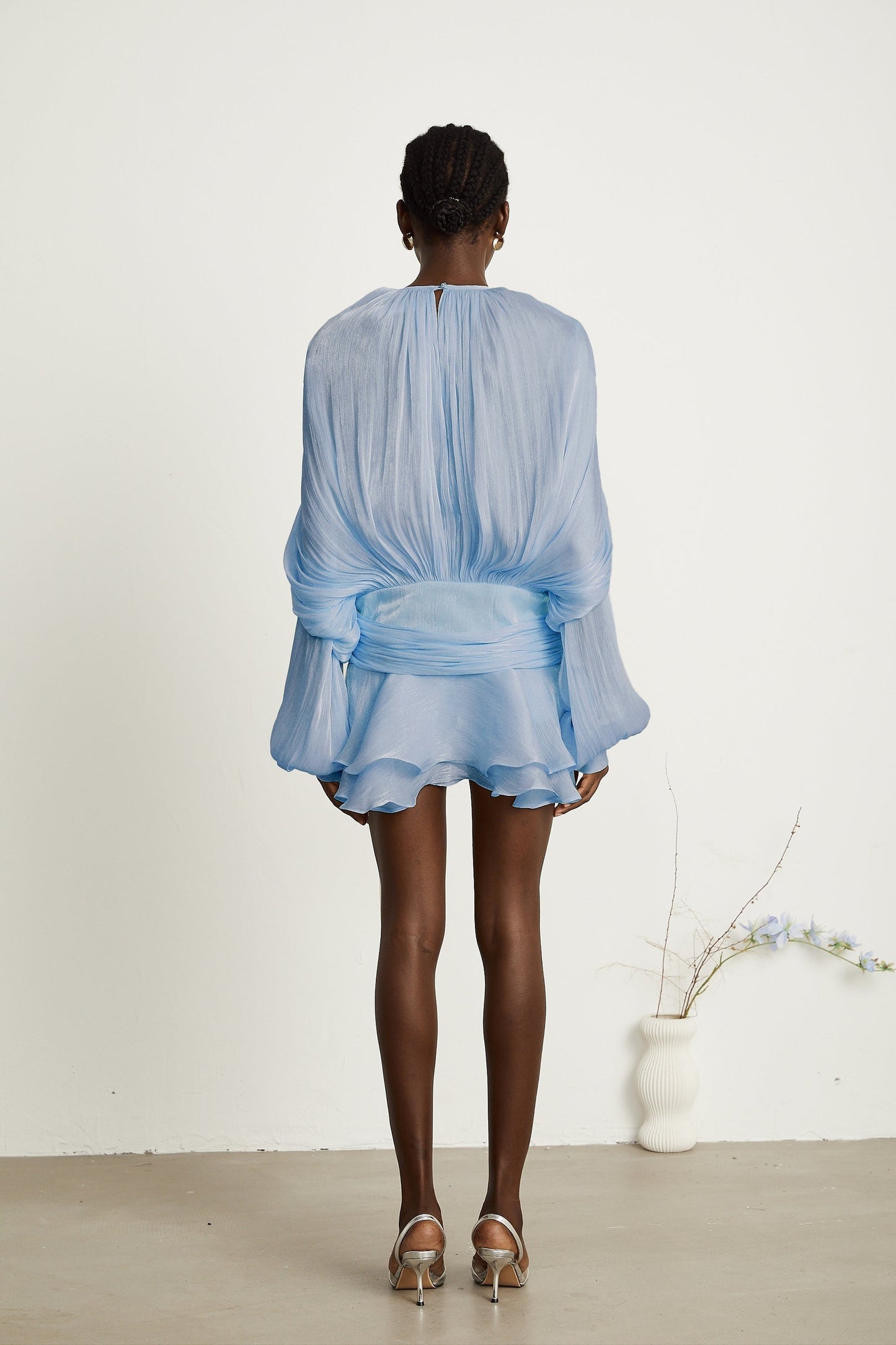 Eugenie blue mini dress with full pleats and ruffled details