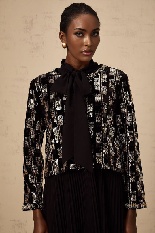 Eva check sequined cardigan and dress matching set featuring a sparkly cardigan and coordinating dress with checkered pattern