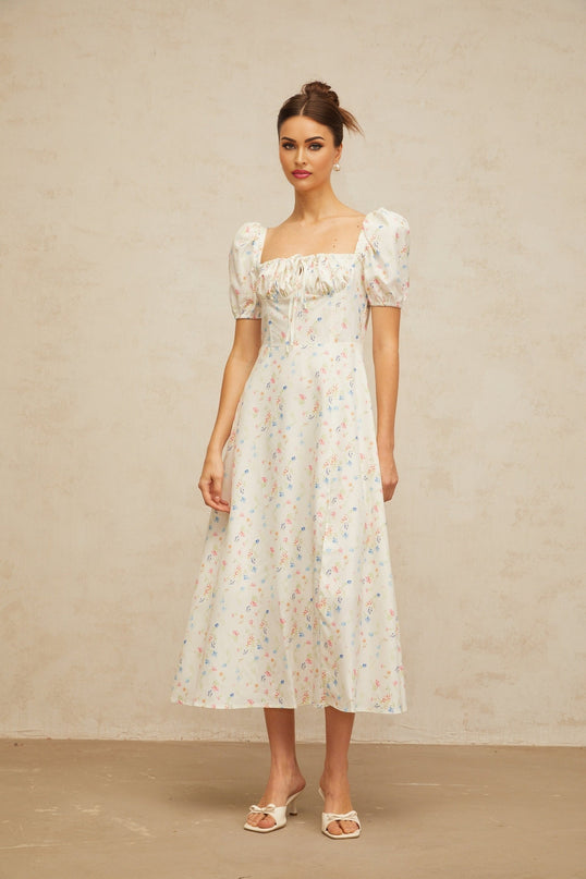 Eva white midi dress with floral print and flared skirt