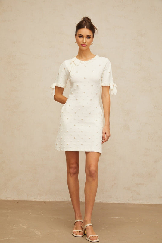 Everleigh White Polka Dot Mini Dress with Heart Cut-Out Detailing and Pearl Embellishments