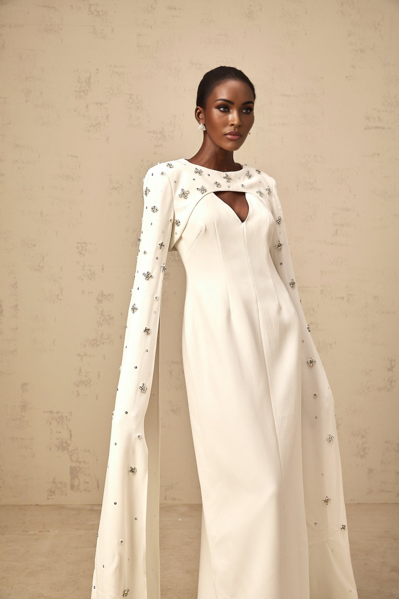 Fanny white extralongsleeve embellished gown