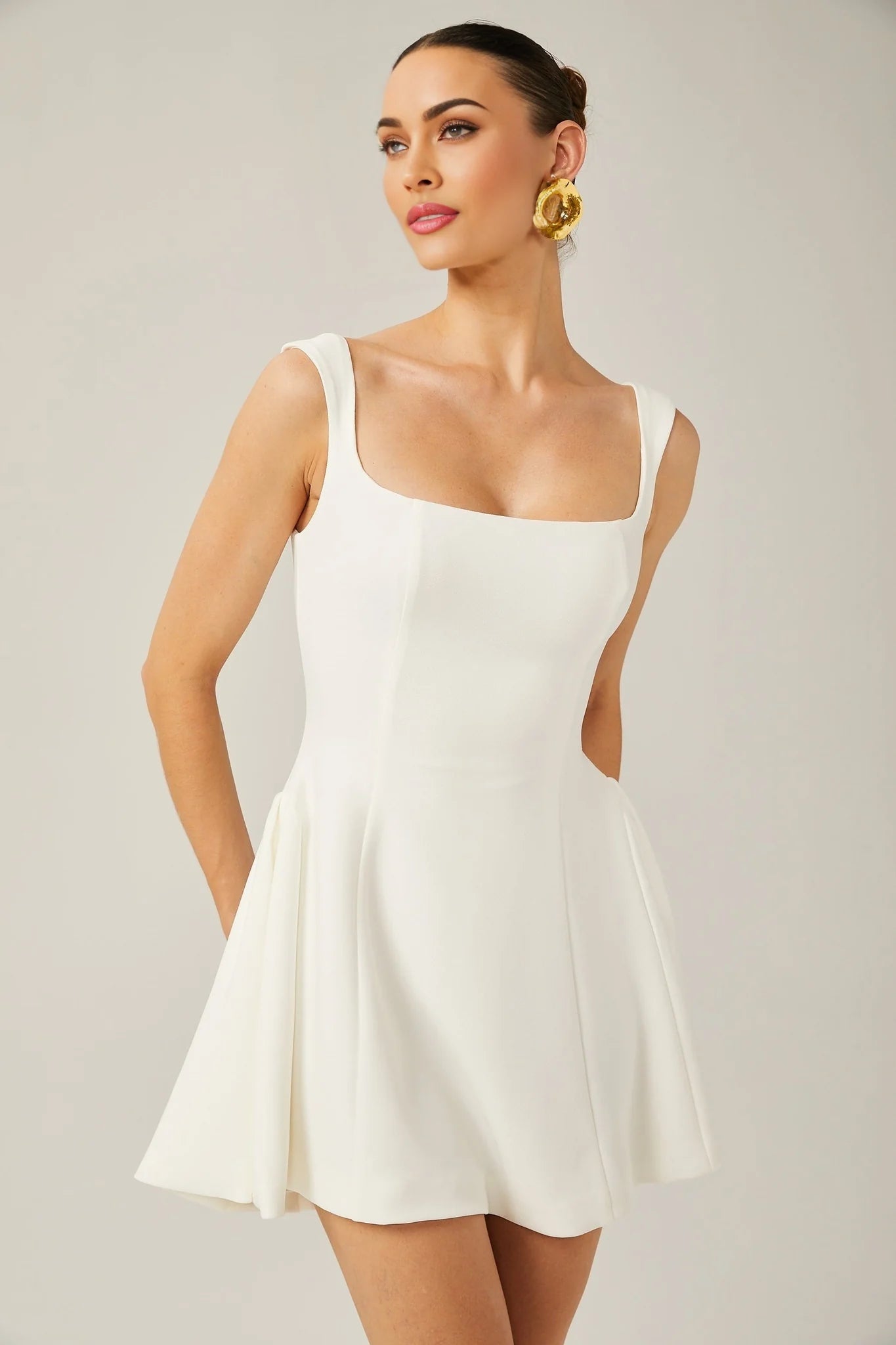 Félicité white sleeveless flared mini dress