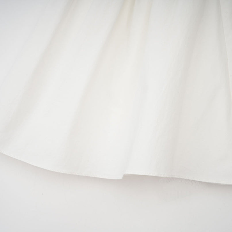 Fiorella White Mini Dress Sleeveless Elastic Detailing Boned Bodice Pleat Flared Skirt Decorative Buttons Rear Zip Fastening Thigh-Length