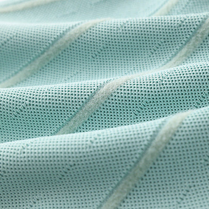 Flared A-line silhouette halter neck style soft mint green knit fabric dress with vertical ribbed pattern