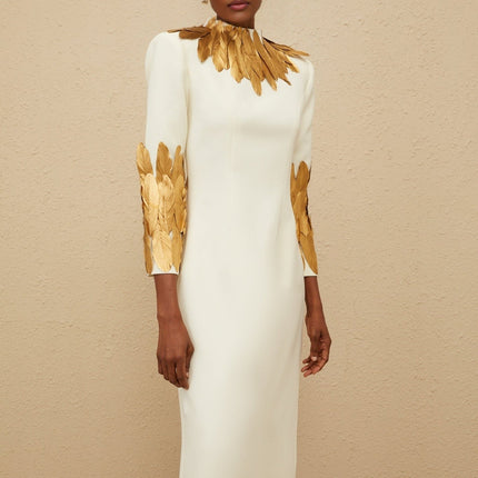 Flora White Maxi Dress with Turtleneck, Long Sleeves, Feather Trim, Fitted Waistline, Rear Slit, and Straight Hem