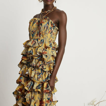 Floral print midi dress with tiered ruffles named Apolline featuring a layered skirt design and allover flower pattern