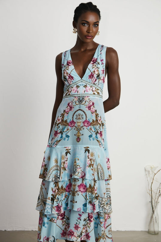 Floral print midi dress with Victoire design featuring a vibrant pattern on a flowing silhouette