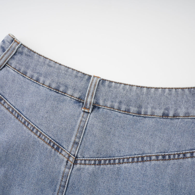 Florence Ruffled Denim Mini Skirt in Light Blue with Ruffled Hem, Belt Loops, and Side Pockets