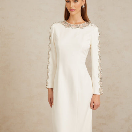 Freja White Crystal Embellished Maxi Gown in pristine white with crystal embellishments and tulle panelling, round neck, long sleeves, fitted waistline, rear slit, and rear zip fastening crafted from 100% Terylene fiber
