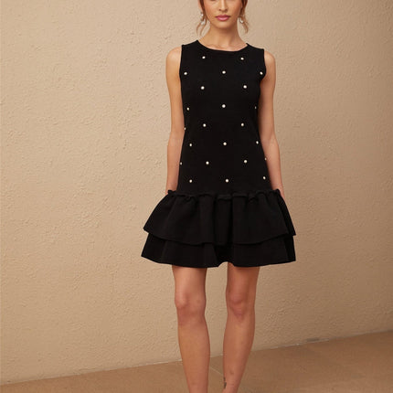 Freya Black Mini Dress with Peplum Hem and Bead Embellishments