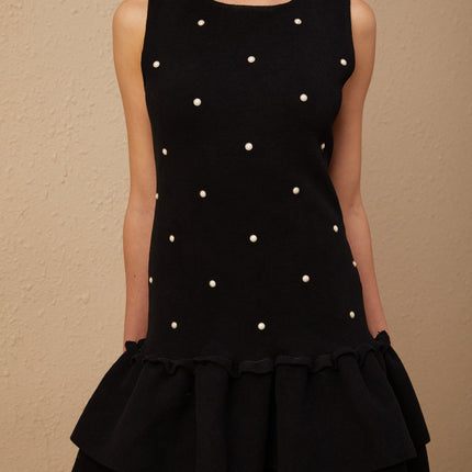 Freya Black Mini Dress with Peplum Hem and Bead Embellishments