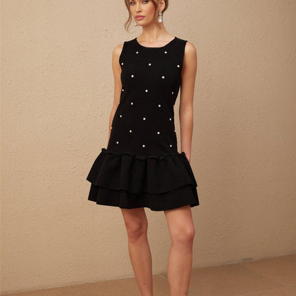 Freya Black Mini Dress with Peplum Hem and Bead Embellishments