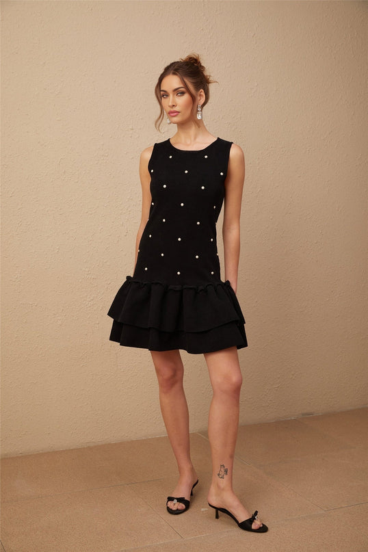 Freya Black Mini Dress with Peplum Hem and Bead Embellishments